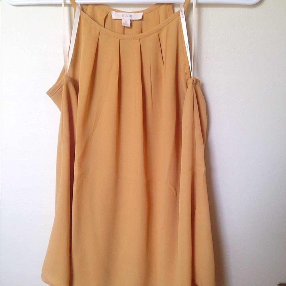 Yellow tank top red VS teddy; red romper